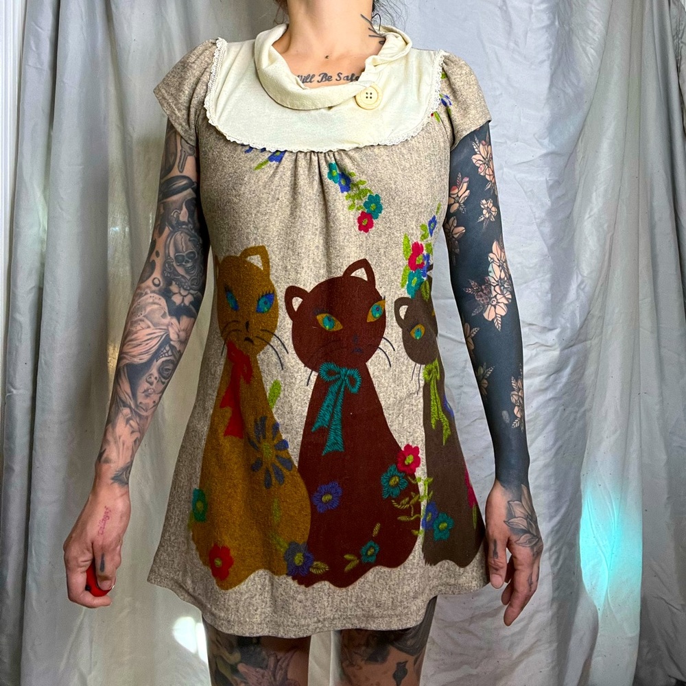 darling little dress made in the UK. sized small.